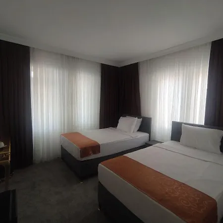 Kadeer Hotel *